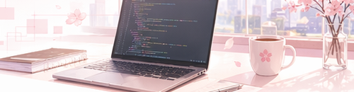 コードが表示されたノートPCと桜のあるデスク